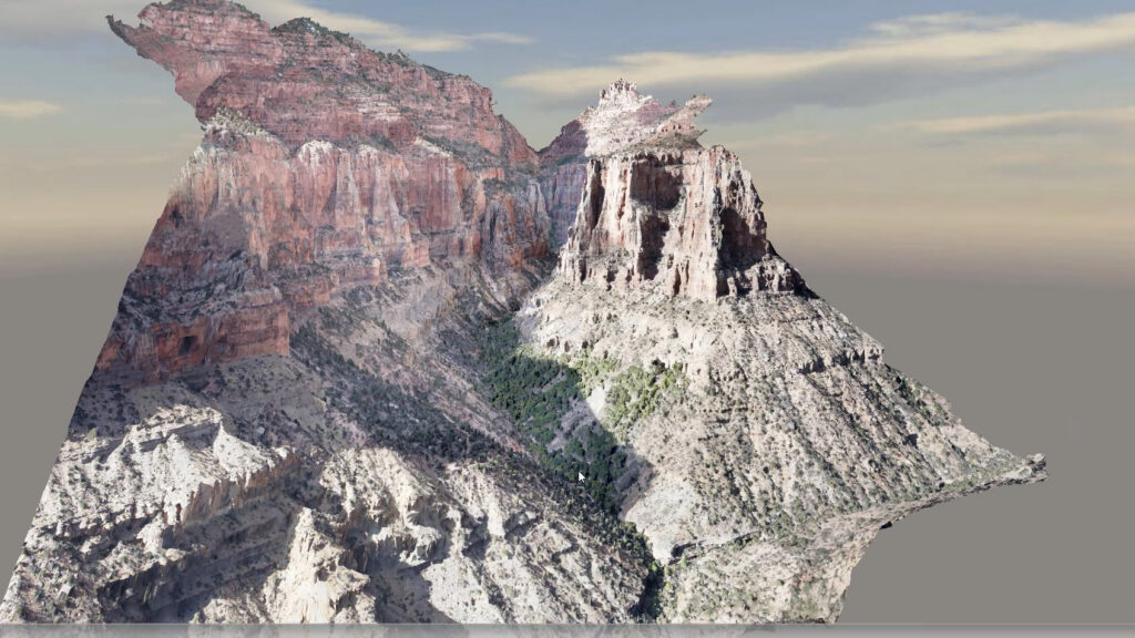 Three dimensional digital twin of Grand Canyon terrain showing steep cliffs, rock formations, and vegetation captured through drone mapping.